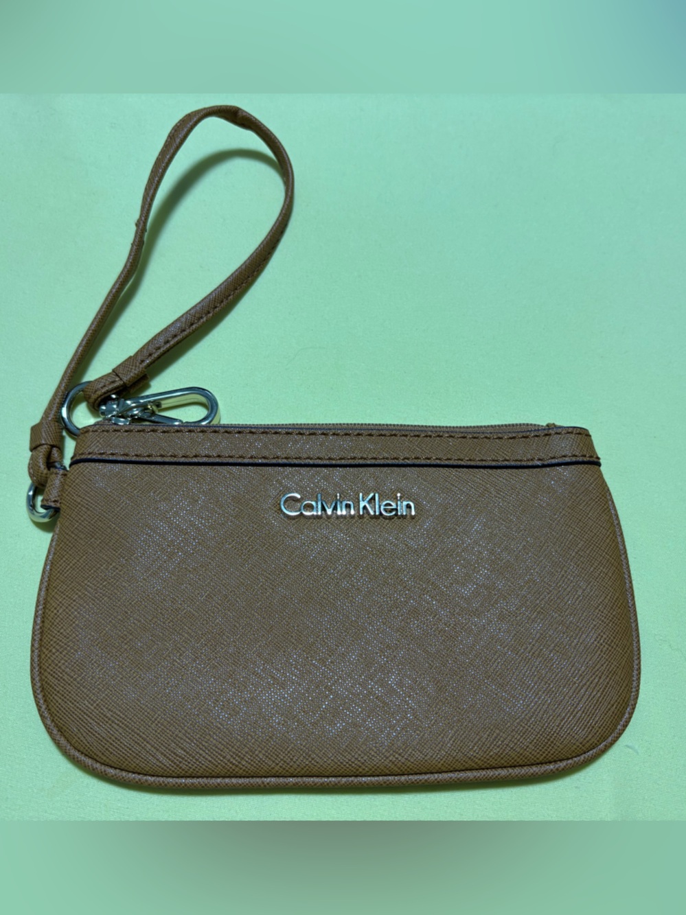 Calvin Klein small leather tan zip Wristlet with Gold Hardware